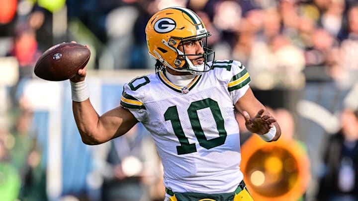 Nov 17, 2024; Chicago, Illinois, USA; Green Bay Packers quarterback Jordan Love (10) passes the ball against the Chicago Bears during the third quarter at Soldier Field. Mandatory Credit: Daniel Bartel-Imagn Images