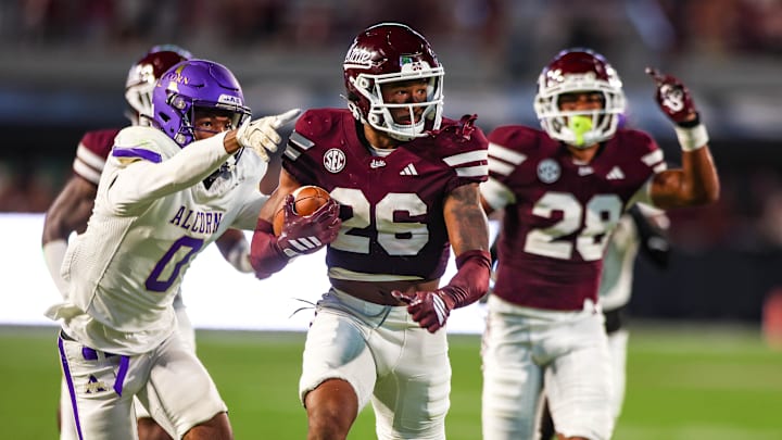 Mississippi State Bulldogs running back Kolin Wilson (26) runs with the ball against the Alcorn State Braves during the second half at Davis Wade Stadium at Scott Field.
