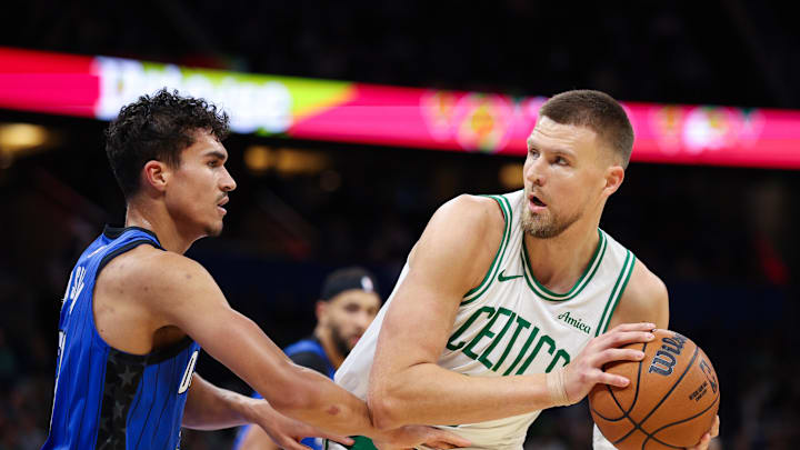 Dec 23, 2024; Orlando, Florida, USA; Boston Celtics center Kristaps Porzingis (8) is guarded by Orlando Magic forward Tristan da Silva (23) in the first quarter at Kia Center. Mandatory Credit: Nathan Ray Seebeck-Imagn Images Dec 23, 2024; Orlando, Florida, USA; Boston Celtics center Kristaps Porzingis (8) is guarded by Orlando Magic forward Tristan da Silva (23) in the first quarter at Kia Center. Mandatory Credit: Nathan Ray Seebeck-Imagn Images