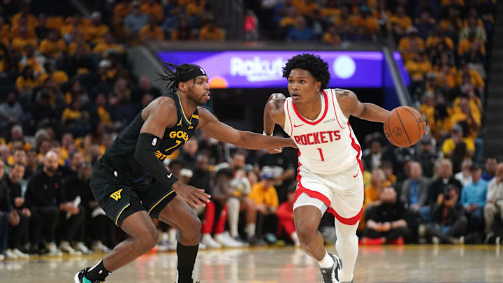 May 2, 2025; San Francisco, California, USA; Houston Rockets forward Amen Thompson (1) dribbles past Golden State Warriors guard Buddy Hield (7) in the second quarter of game six of the first round for the 2025 NBA Playoffs at Chase Center. Mandatory Credit: Cary Edmondson-Imagn Images May 2, 2025; San Francisco, California, USA; Houston Rockets forward Amen Thompson (1) dribbles past Golden State Warriors guard Buddy Hield (7) in the second quarter of game six of the first round for the 2025 NBA Playoffs at Chase Center. Mandatory Credit: Cary Edmondson-Imagn Images