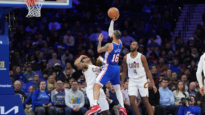 Nov 13, 2024; Philadelphia, Pennsylvania, USA; Philadelphia 76ers forward Caleb Martin (16) shoots against Cleveland Cavaliers forward Isaac Okoro (35) in the third quarter at Wells Fargo Center. Mandatory Credit: Kyle Ross-Imagn Images Nov 13, 2024; Philadelphia, Pennsylvania, USA; Philadelphia 76ers forward Caleb Martin (16) shoots against Cleveland Cavaliers forward Isaac Okoro (35) in the third quarter at Wells Fargo Center. Mandatory Credit: Kyle Ross-Imagn Images