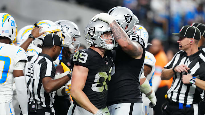 Jan 5, 2025; Paradise, Nevada, USA; Las Vegas Raiders center Andre James (68) consoles Las Vegas Raiders tight end Brock Bowers (89) after a missed reception against the Los Angeles Chargers during the fourth quarter at Allegiant Stadium. Mandatory Credit: Stephen R. Sylvanie-Imagn Images