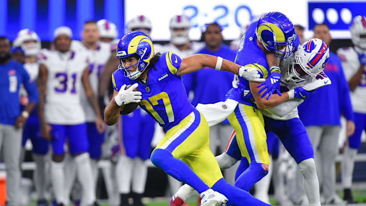 Dec 8, 2024; Inglewood, California, USA; Los Angeles Rams wide receiver Puka Nacua (17) runs the ball for a touchdown against the Buffalo Bills during the second half at SoFi Stadium. Mandatory Credit: Gary A. Vasquez-Imagn Images