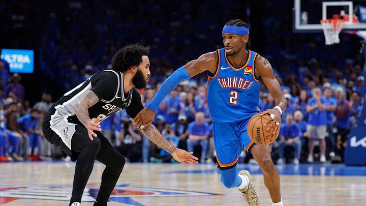 May 30, 2026; Oklahoma City, Oklahoma, USA; Oklahoma City Thunder guard Shai Gilgeous-Alexander (2) controls the ball against San Antonio Spurs forward Julian Champagnie (30) in the fourth quarter during game seven of the western conference finals for the 2026 NBA playoffs at Paycom Center. Mandatory Credit: Alonzo Adams-Imagn Images May 30, 2026; Oklahoma City, Oklahoma, USA; Oklahoma City Thunder guard Shai Gilgeous-Alexander (2) controls the ball against San Antonio Spurs forward Julian Champagnie (30) in the fourth quarter during game seven of the western conference finals for the 2026 NBA playoffs at Paycom Center. Mandatory Credit: Alonzo Adams-Imagn Images
