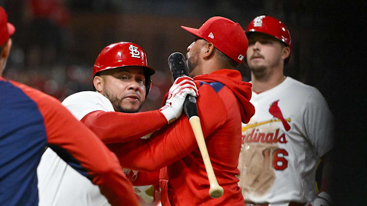 Aug 25, 2025; St. Louis, Missouri, USA;  St. Louis Cardinals designated hitter Willson Contreras (40) is held back by manager Oliver Marmol (37) after he was ejected by umpire Derek Thomas (not pictured) during the seventh inning against the Pittsburgh Pirates at Busch Stadium. Mandatory Credit: Jeff Curry-Imagn Images