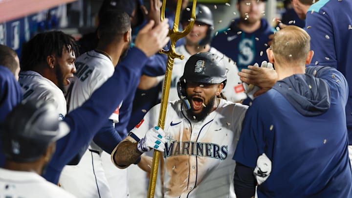 Seattle Mariners shortstop J.P. Crawford (3) celebrates in the dugout after hitting a two-run home run against the Minnesota Twins during the seventh inning at T-Mobile Park on May 31. Seattle Mariners shortstop J.P. Crawford (3) celebrates in the dugout after hitting a two-run home run against the Minnesota Twins during the seventh inning at T-Mobile Park on May 31.