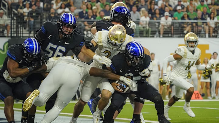 Oct 8, 2022; Paradise, Nevada, USA; Notre Dame Fighting Irish safety DJ Brown (2) sacks Brigham Young Cougars quarterback Jaren Hall (3) during the first half at Allegiant Stadium. Mandatory Credit: Lucas Peltier-Imagn Images Oct 8, 2022; Paradise, Nevada, USA; Notre Dame Fighting Irish safety DJ Brown (2) sacks Brigham Young Cougars quarterback Jaren Hall (3) during the first half at Allegiant Stadium. Mandatory Credit: Lucas Peltier-Imagn Images