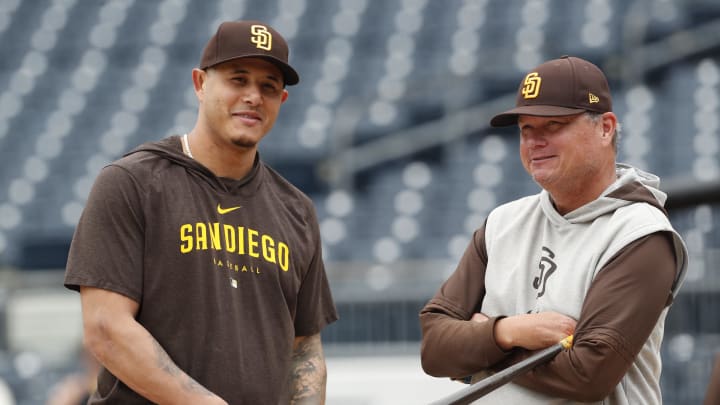 Shildt (right) has helped institute a successful 1980s-style hitting approach in San Diego.