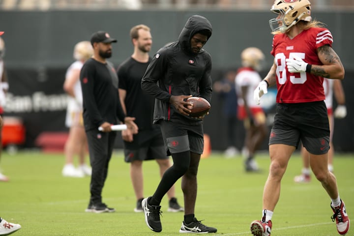 Jul 24, 2025; Santa Clara, CA, USA; Still recovering from knee surgery, San Francisco 49ers wide receiver Brandon Aiyuk (left