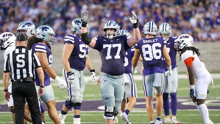 Aug 31, 2024; Manhattan, Kansas, USA; Kansas State Wildcats offensive lineman Carver Willis (77) celebrates a field goal during the third quarter against the Tennessee-Martin Skyhawks at Bill Snyder Family Football Stadium. Mandatory Credit: Scott Sewell-Imagn Images