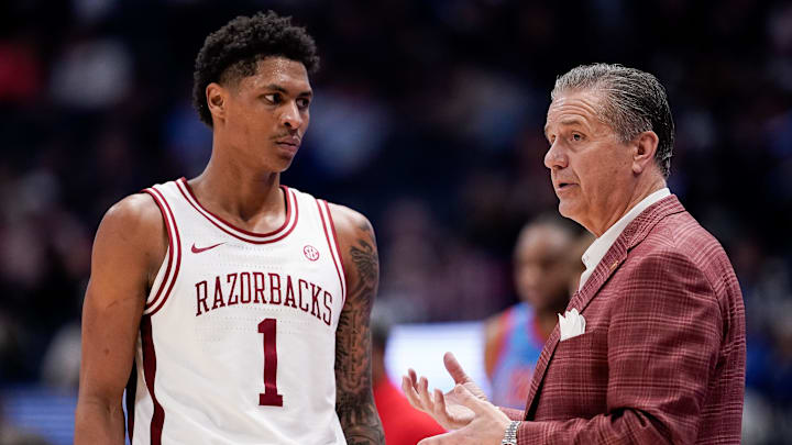 Arkansas coach John Calipari works with guard Meleek Thomas (1) during the second half of a SEC tournament semifinal game against Mississippi at Bridgestone Arena in Nashville, Tenn., Saturday, March 14, 2026.