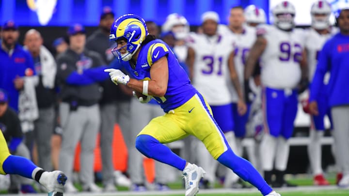 Dec 8, 2024; Inglewood, California, USA; Los Angeles Rams wide receiver Puka Nacua (17) runs the ball for a touchdown against the Buffalo Bills during the second half at SoFi Stadium. Mandatory Credit: Gary A. Vasquez-Imagn Images