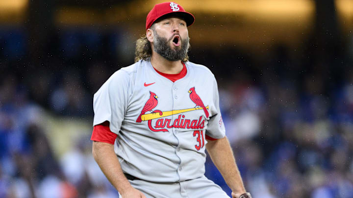 Mar 30, 2024; Los Angeles, California, USA; St. Louis Cardinals starting pitcher Lance Lynn (31) celebrates after a strikeout against the Dodgers. 
