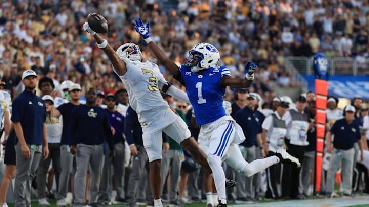 Dec 27, 2025; Orlando, FL, USA; BYU Cougars cornerback Therrian Alexander III (1) defends Georgia Tech Yellow Jackets wide receiver Eric Rivers (3) during the first half at Camping World Stadium. Mandatory Credit: Kim Klement Neitzel-Imagn Images