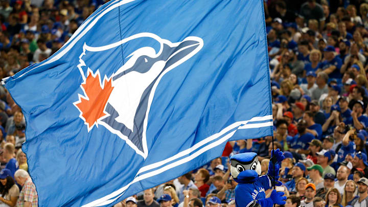 Toronto Blue Jays mascot Ace waves a Blue Jays flag Toronto Blue Jays mascot Ace waves a Blue Jays flag