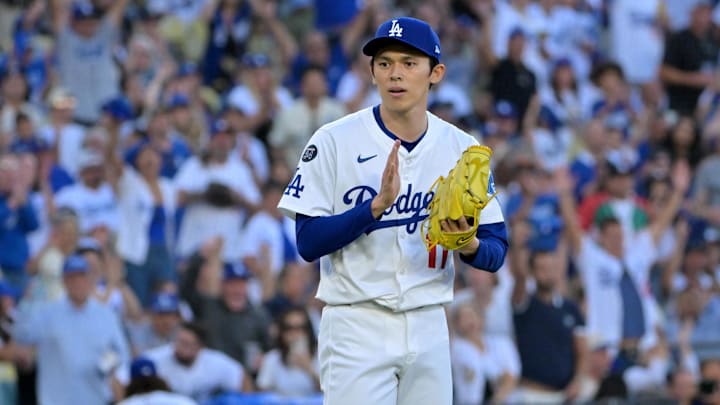 Oct 9, 2025; Los Angeles, California, USA; Los Angeles Dodgers pitcher Roki Sasaki (11) reacts after the eighth inning against the Philadelphia Phillies during game four of the NLDS round for the 2025 MLB playoffs at Dodger Stadium. Mandatory Credit: Jayne Kamin-Oncea-Imagn Images
