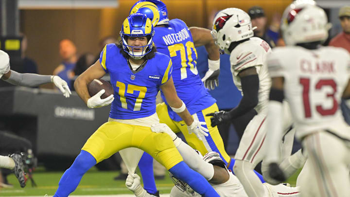 Dec 28, 2024; Inglewood, California, USA; Los Angeles Rams wide receiver Puka Nacua (17) gains a first down before he is stopped by Arizona Cardinals defensive tackle Dante Stills (55) in the second half at SoFi Stadium. Mandatory Credit: Jayne Kamin-Oncea-Imagn Images Dec 28, 2024; Inglewood, California, USA; Los Angeles Rams wide receiver Puka Nacua (17) gains a first down before he is stopped by Arizona Cardinals defensive tackle Dante Stills (55) in the second half at SoFi Stadium. Mandatory Credit: Jayne Kamin-Oncea-Imagn Images