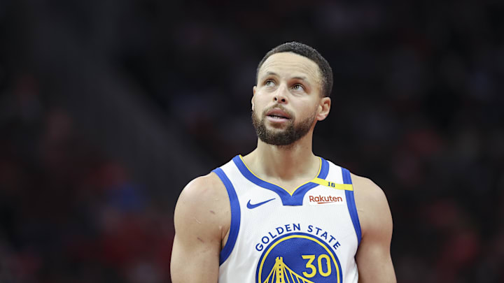 Golden State Warriors guard Stephen Curry looks up after a play during the fourth quarter against the Houston Rockets at Toyota Center on December 11, 2024. 