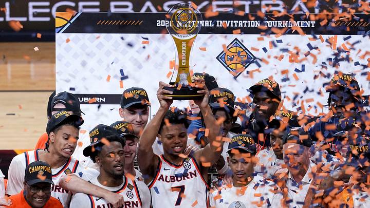 The Auburn Tigers celebrate Sunday, April 5, 2026, after defeating the Tulsa Golden Hurricane in the men’s NIT championship game at Gainbridge Fieldhouse in Indianapolis. The Auburn Tigers celebrate Sunday, April 5, 2026, after defeating the Tulsa Golden Hurricane in the men’s NIT championship game at Gainbridge Fieldhouse in Indianapolis.