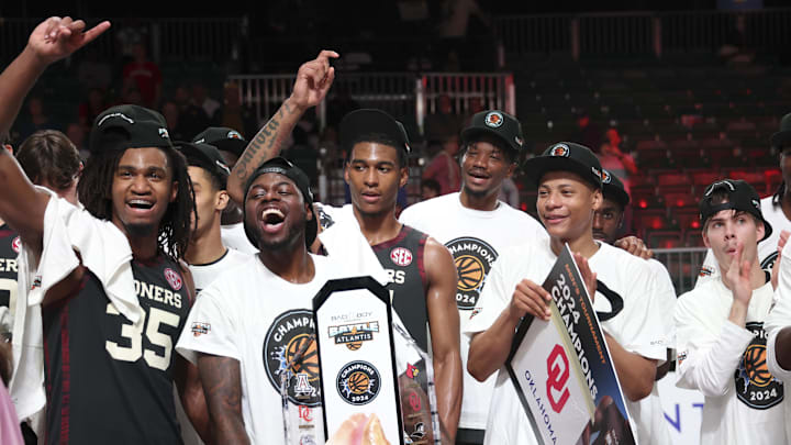 Nov 29, 2024; Paradise Island, Bahamas, BHS; Oklahoma Sooners players celebrate winning the championship after the game against the Louisville Cardinals at Imperial Arena at the Atlantis resort.  Mandatory Credit: Kevin Jairaj-Imagn Images