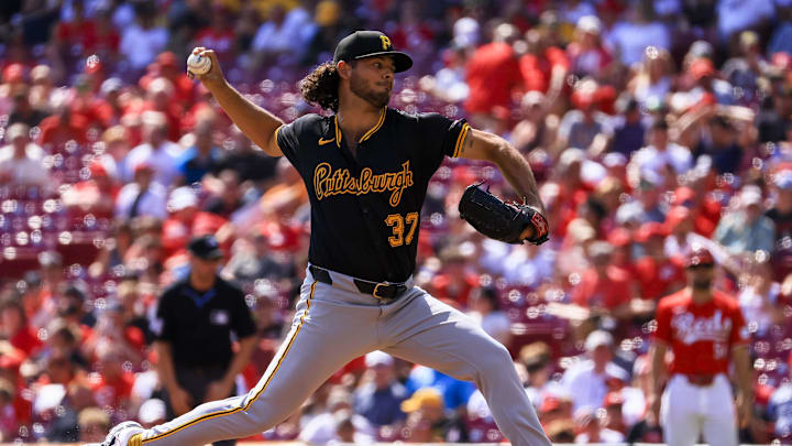 Sep 21, 2024; Cincinnati, Ohio, USA; Pittsburgh Pirates starting pitcher Jared Jones (37) pitches against the Cincinnati Reds in the first inning at Great American Ball Park. Mandatory Credit: Katie Stratman-Imagn Images Sep 21, 2024; Cincinnati, Ohio, USA; Pittsburgh Pirates starting pitcher Jared Jones (37) pitches against the Cincinnati Reds in the first inning at Great American Ball Park. Mandatory Credit: Katie Stratman-Imagn Images