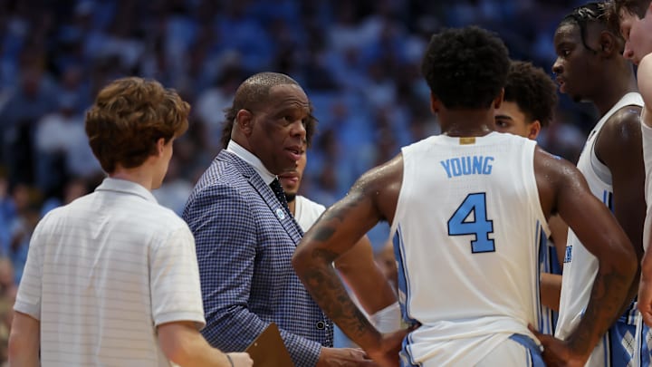 Jan 10, 2026; Chapel Hill, North Carolina, USA; North Carolina Tar Heels head coach Hubert Davis speaks to the team during a time out against the Wake Forest Demon Deacons during the second half at Dean E. Smith Center. Mandatory Credit: Cory Knowlton-Imagn Images
