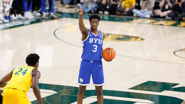 Feb 10, 2026; Waco, Texas, USA;  BYU Cougars forward AJ Dybantsa (3) calls a play as Baylor Bears guard Tounde Yessoufou (24) defends during the first half at Paul and Alejandra Foster Pavilion. Mandatory Credit: Chris Jones-Imagn Images