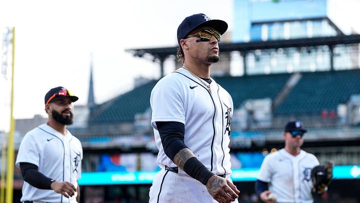 Detroit Tigers shortstop Javier Báez (28), center, walks off the field after top of the seventh inning against Kansas City Royals at Comerica Park in Detroit on Thursday, April 16, 2026.