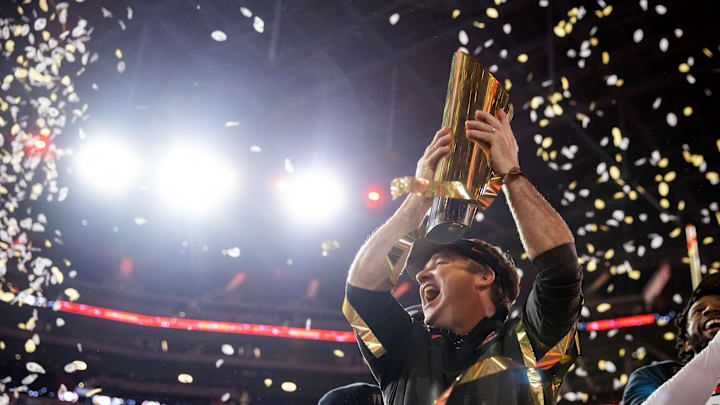 Jan 9, 2023; Inglewood, CA, USA; Georgia Bulldogs head coach Kirby Smart celebrates with the trophy after winning the CFP.