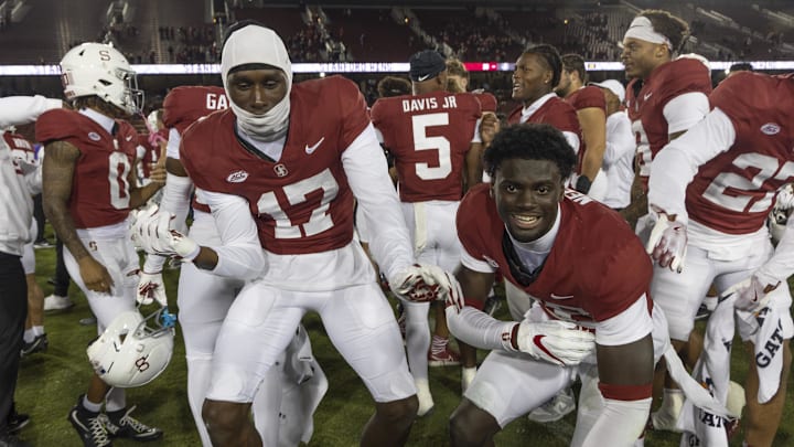 Oct 18, 2025; Stanford, California, USA;  Stanford Cardinal safety Omari Gaines (17) and defensive back Sam Neely III (28) celebrate after a victory over Florida State Seminoles at Stanford Stadium. Mandatory Credit: Stan Szeto-Imagn Images
