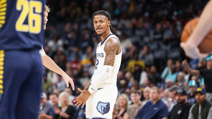 Memphis Grizzlies guard Ja Morant (12) reacts against the Indiana Pacers during the first half at FedExForum. Memphis Grizzlies guard Ja Morant (12) reacts against the Indiana Pacers during the first half at FedExForum.