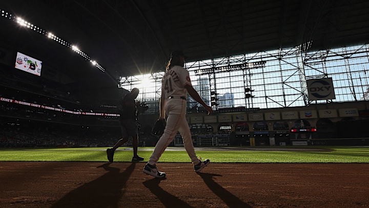 Aug 12, 2025; Houston, Texas, USA; Houston Astros starting pitcher Spencer Arrighetti (41) walks on the field before the game
