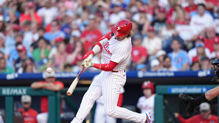 May 17, 2025; Philadelphia, Pennsylvania, USA; Philadelphia Phillies infielder Bryson Stott (5) hits a home run against the Pittsburgh Pirates in the third inning at Citizens Bank Park. 