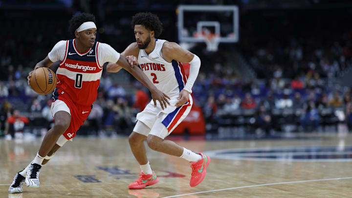 Nov 17, 2024; Washington, District of Columbia, USA; Washington Wizards guard Bilal Coulibaly (0) drives to the basket as Detroit Pistons guard Cade Cunningham (2) defends in the second half at Capital One Arena. Mandatory Credit: Geoff Burke-Imagn Images