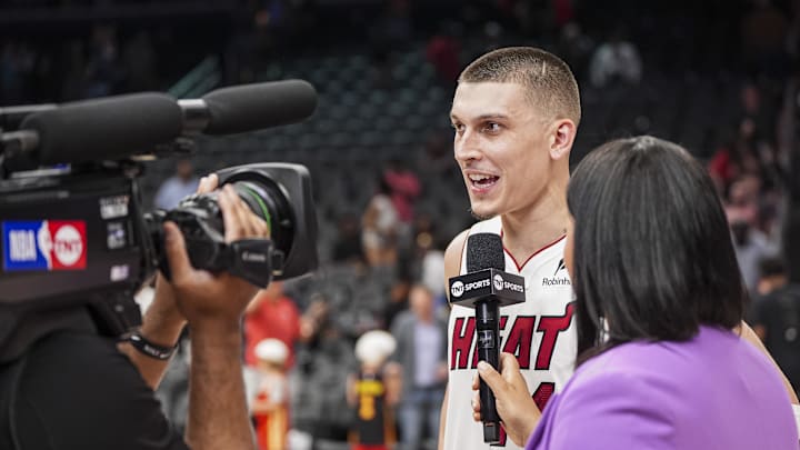 Apr 18, 2025; Atlanta, Georgia, USA; Miami Heat guard Tyler Herro (14) is interviewed after the Heat defeated the Atlanta Hawks in overtime at State Farm Arena. Mandatory Credit: Dale Zanine-Imagn Images