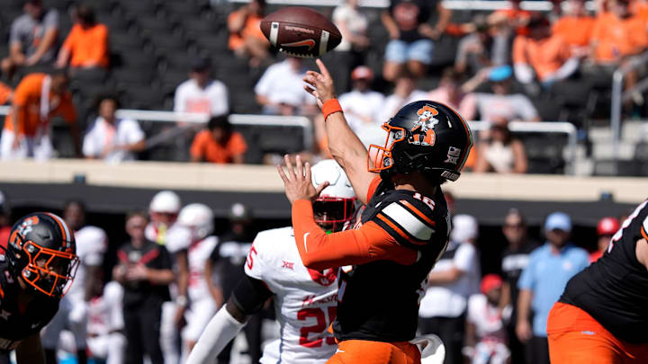 Oklahoma State Cowboys quarterback Noah Walters (12) throws a pass during a college football game between the Oklahoma State Cowboys (OSU) and the Houston Cougars at Boone Pickens Stadium in Stillwater, Okla., Saturday, Oct. 11, 2025. Houston won 39-17.