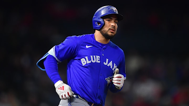 May 6, 2025; Anaheim, California, USA; Toronto Blue Jays right fielder Anthony Santander (25) hits a solo home run against the Los Angeles Angels during the eighth inning at Angel Stadium. May 6, 2025; Anaheim, California, USA; Toronto Blue Jays right fielder Anthony Santander (25) hits a solo home run against the Los Angeles Angels during the eighth inning at Angel Stadium.
