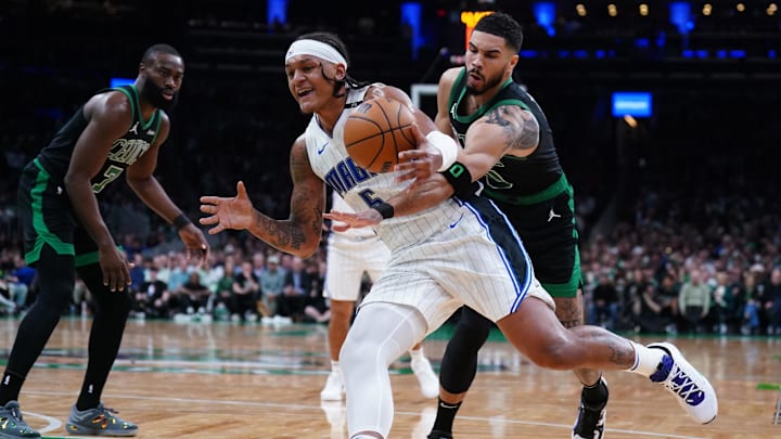 Apr 29, 2025; Boston, Massachusetts, USA; Boston Celtics forward Jayson Tatum (0) defends against Orlando Magic forward Paolo Banchero (5) in the second quarter during game five of first round for the 2025 NBA Playoffs at TD Garden. Mandatory Credit: David Butler II-Imagn Images Apr 29, 2025; Boston, Massachusetts, USA; Boston Celtics forward Jayson Tatum (0) defends against Orlando Magic forward Paolo Banchero (5) in the second quarter during game five of first round for the 2025 NBA Playoffs at TD Garden. Mandatory Credit: David Butler II-Imagn Images