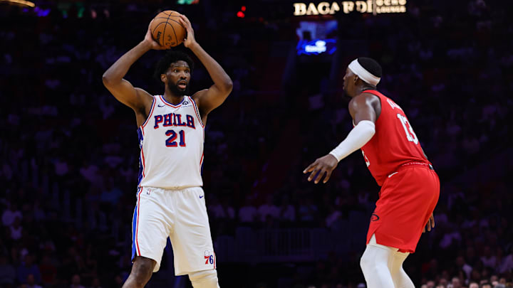 Nov 18, 2024; Miami, Florida, USA; Philadelphia 76ers center Joel Embiid (21) controls the basketball against Miami Heat center Bam Adebayo (13) during the fourth quarter at Kaseya Center. Mandatory Credit: Sam Navarro-Imagn Images Nov 18, 2024; Miami, Florida, USA; Philadelphia 76ers center Joel Embiid (21) controls the basketball against Miami Heat center Bam Adebayo (13) during the fourth quarter at Kaseya Center. Mandatory Credit: Sam Navarro-Imagn Images