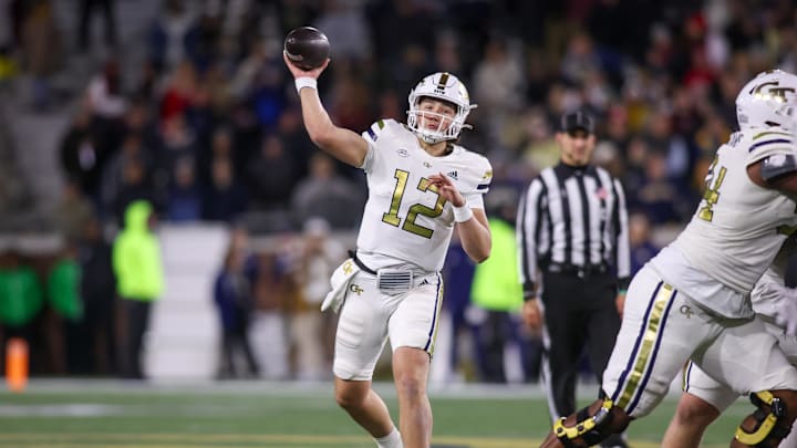 Nov 21, 2024; Atlanta, Georgia, USA; Georgia Tech Yellow Jackets quarterback Aaron Philo (12) throws a pass against the North Carolina State Wolfpack in the third quarter at Bobby Dodd Stadium at Hyundai Field. Mandatory Credit: Brett Davis-Imagn Images