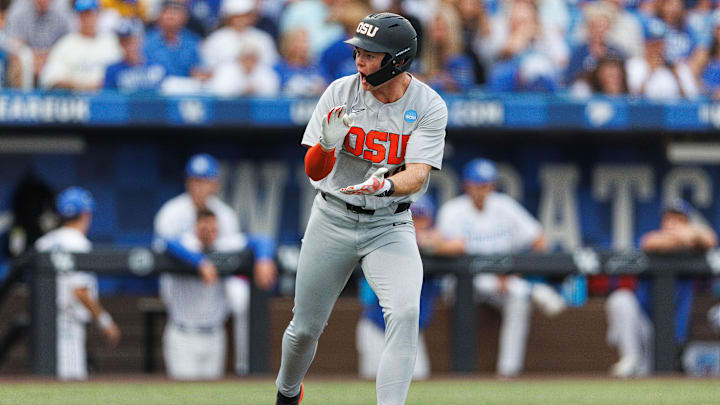 Jun 8, 2024; Lexington, KY, USA; Oregon State Beavers infielder Trent Caraway (44) celebrates after being walked during the seventh inning against the Kentucky Wildcats at Kentucky Proud Park. Jun 8, 2024; Lexington, KY, USA; Oregon State Beavers infielder Trent Caraway (44) celebrates after being walked during the seventh inning against the Kentucky Wildcats at Kentucky Proud Park.