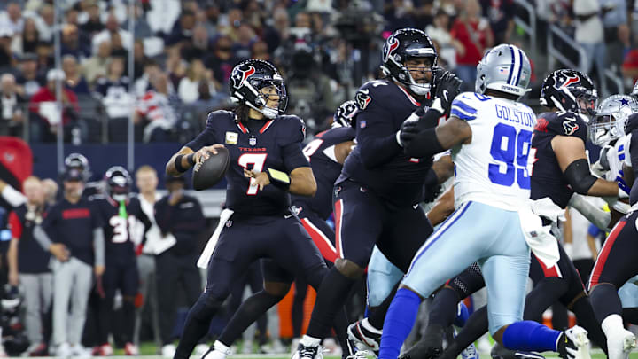 Nov 18, 2024; Arlington, Texas, USA;  Houston Texans quarterback C.J. Stroud (7) throws during the first quarter against the Dallas Cowboys at AT&T Stadium. Mandatory Credit: Kevin Jairaj-Imagn Images