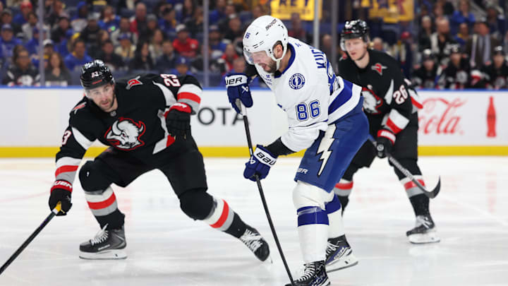 Apr 6, 2026; Buffalo, New York, USA;  Buffalo Sabres defenseman Mattias Samuelsson (23) looks to block a shot by Tampa Bay Lightning right wing Nikita Kucherov (86) during the third period at KeyBank Center. Mandatory Credit: Timothy T. Ludwig-Imagn Images