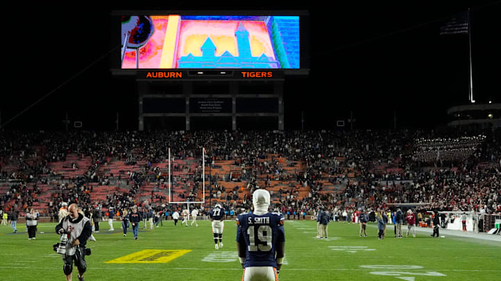 Nov 29, 2025; Auburn, Alabama, USA; Auburn safety Sylvester Smith (19) stands on the field after Auburn lost to Alabama 27-20 at Jordan-Hare Stadium. Mandatory Credit: Gary Cosby Jr.-Tuscaloosa News Nov 29, 2025; Auburn, Alabama, USA; Auburn safety Sylvester Smith (19) stands on the field after Auburn lost to Alabama 27-20 at Jordan-Hare Stadium. Mandatory Credit: Gary Cosby Jr.-Tuscaloosa News
