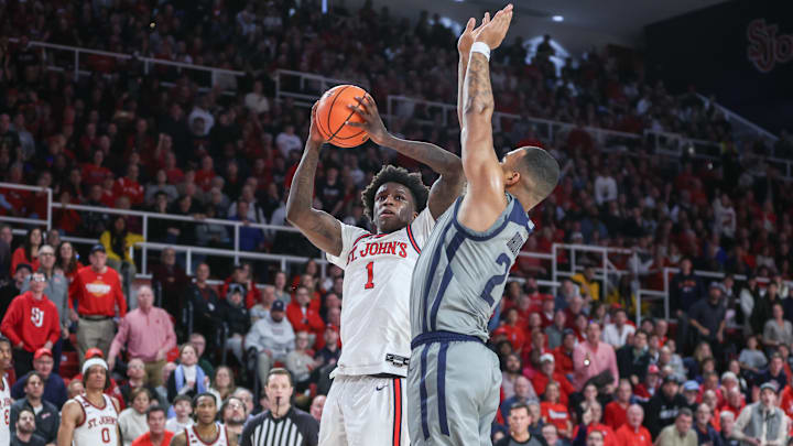 Jan 4, 2025; Queens, New York, USA;  St. John's basketball guard Kadary Richmond (1) looks to post up against Butler Bulldogs forward Pierre Brooks II (21) in the second half at Carnesecca Arena.