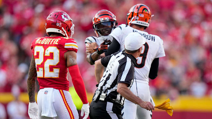 Cincinnati Bengals quarterback Joe Burrow (9) attempts to hold back wide receiver Ja'Marr Chase (1) as he continues to shout at a referee in the fourth quarter of the NFL Week 2 game between the Kansas City Chiefs and the Cincinnati Bengals at Arrowhead Stadium in Kansas City on Sunday, Sept. 15, 2024. The Chiefs took a 26-25 win with a go-ahead field goal as time expired.
