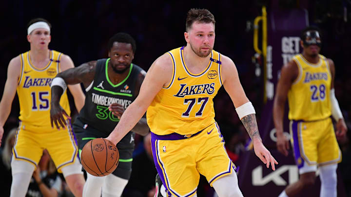 Apr 30, 2025; Los Angeles, California, USA; Los Angeles Lakers guard Luka Doncic (77) moves the ball up court against the Minnesota Timberwolves during the first half in game five of first round for the 2025 NBA Playoffs at Crypto.com Arena. Mandatory Credit: Gary A. Vasquez-Imagn Images Apr 30, 2025; Los Angeles, California, USA; Los Angeles Lakers guard Luka Doncic (77) moves the ball up court against the Minnesota Timberwolves during the first half in game five of first round for the 2025 NBA Playoffs at Crypto.com Arena. Mandatory Credit: Gary A. Vasquez-Imagn Images