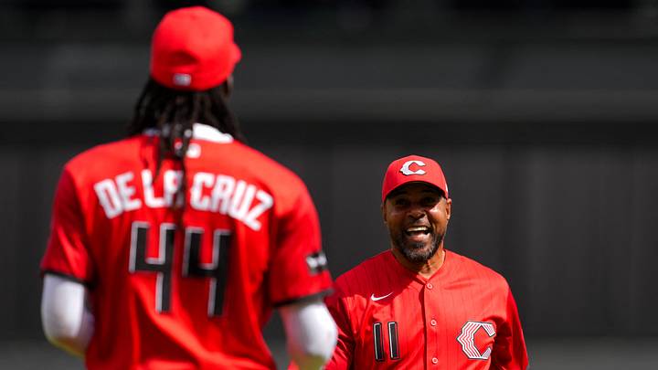Apr 11, 2026; Cincinnati, Ohio, USA; Former Cincinnati player and Hall of Famer Barry Larkin throws out the ceremonial first pitch to Cincinnati Reds shortstop Elly de la Cruz, before the game against the Los Angeles Angels at Great American Ball Park. Mandatory Credit: Aaron Doster-Imagn Images Apr 11, 2026; Cincinnati, Ohio, USA; Former Cincinnati player and Hall of Famer Barry Larkin throws out the ceremonial first pitch to Cincinnati Reds shortstop Elly de la Cruz, before the game against the Los Angeles Angels at Great American Ball Park. Mandatory Credit: Aaron Doster-Imagn Images