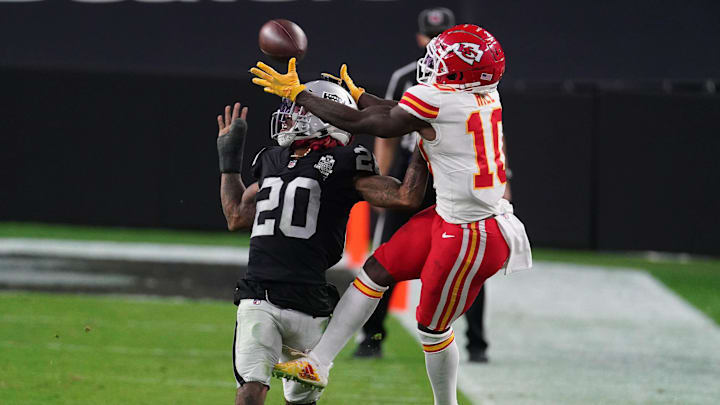 Nov 22, 2020; Paradise, Nevada, USA; Las Vegas Raiders cornerback Damon Arnette (20) breaks up a pass intended for Kansas City Chiefs wide receiver Tyreek Hill (10) during the second half at Allegiant Stadium. Mandatory Credit: Kirby Lee-Imagn Images