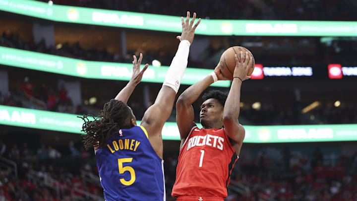 Apr 23, 2025; Houston, Texas, USA; Houston Rockets forward Amen Thompson (1) attempts to shoot the ball as Golden State Warriors forward Kevon Looney (5) defends during the third quarter during game two of the first round for the 2024 NBA Playoffs at Toyota Center. Mandatory Credit: Troy Taormina-Imagn Images Apr 23, 2025; Houston, Texas, USA; Houston Rockets forward Amen Thompson (1) attempts to shoot the ball as Golden State Warriors forward Kevon Looney (5) defends during the third quarter during game two of the first round for the 2024 NBA Playoffs at Toyota Center. Mandatory Credit: Troy Taormina-Imagn Images